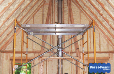 Construction platform inside house to reach ceiling for spray foam insulation application