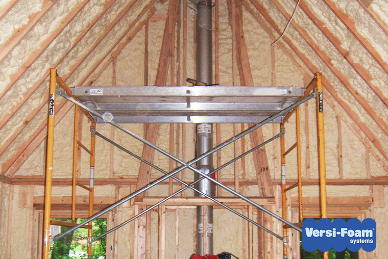 Construction platform inside house to reach ceiling for spray foam insulation application